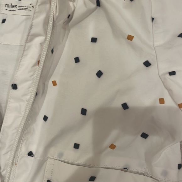 Miles Raincoat in white black and mustard yellow confetti pieces - Picture 4 of 5